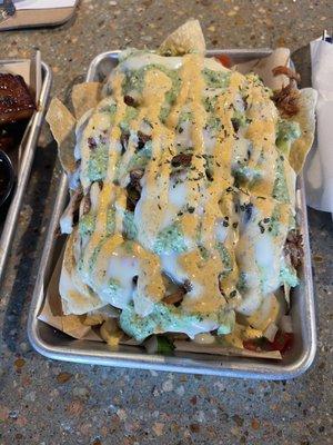 Nachos. Add pork.