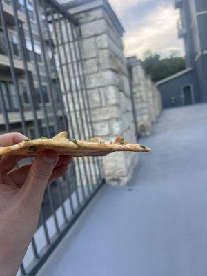 Thinnest pizza crust I've ever had. I ordered a regular crust pizza and it came out thinner than a thin crust pizza.