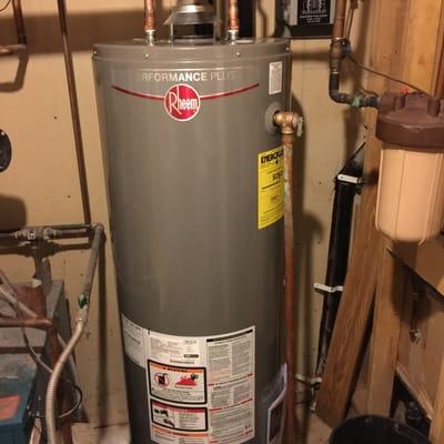 Planet Plumbing & Drain installs a new Rheem water heater in Louisville, CO.