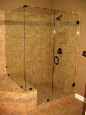 Frameless shower door with clips.