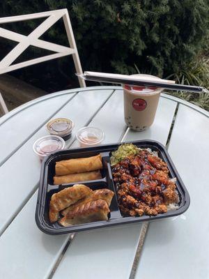 Brown Sugar Oolong Tea   Bento Box Chicken Rice W/ Vegetables spring Rolls & Pan-fried chicken dumplings