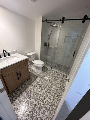 New Shower, tiles, floor, vanity and toilet