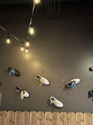 Golf shoes on the wall