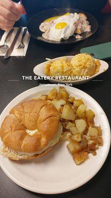 Famous hash casserole,  breakfast sandwich, and chipped beef gravy on rye