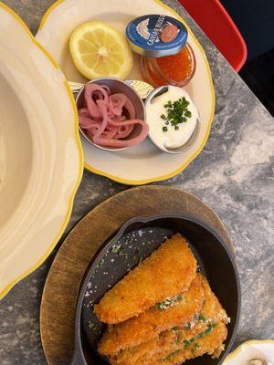 Caviar Hash Brown Smoked Pacific Steelhead Trout roe (1 oz.), crisp potato hash, crème fraîche, and pickled red onion