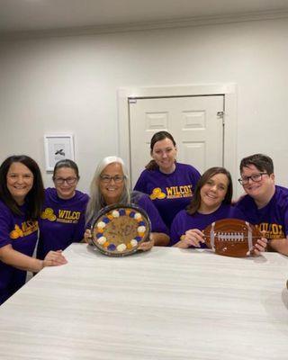 Wearing our purple & gold never gets old! Football season is back, and we are kicking it off with a team tailgate & corn hole...