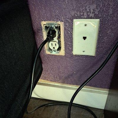 Exposed outlet, a fire and safety hazard