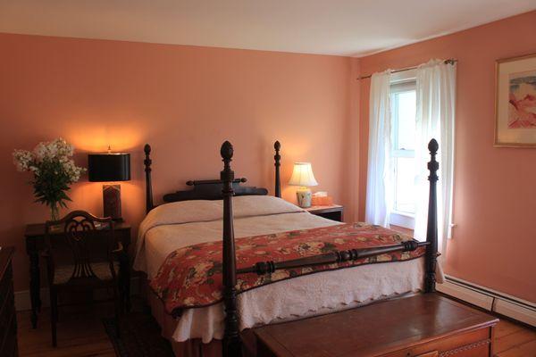 The comfortable "breccia" colored Master bedroom overlooking the gardens, southeast exposure.