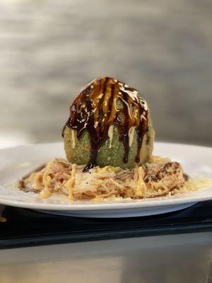 Dino egg- fried avocado stuffed with crab and tuna