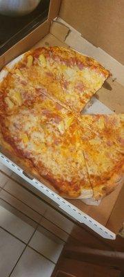 No, this is not a cheese pizza, it is supposed to be a Hawaiian.