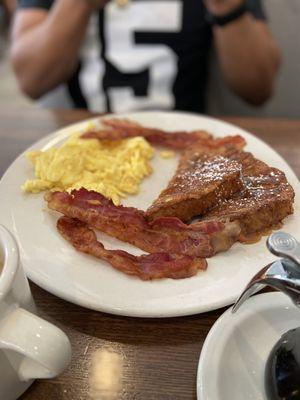 French toast, bacon, and eggs