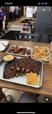 Full rack ribs, half dozen smoked wings, fries, Mac, cornbread