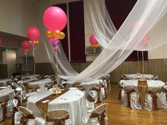 Large black light balloons with additional blinking twinkle lights made a big statement for this 15th birthday party. #balloonsbycarolyn