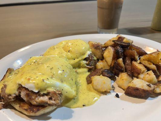 In-house crafted carnitas Benedict with creamy hollandaise sauce over crispy toasted English muffins and crispy home fries.