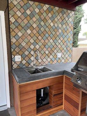 Outdoor kitchen backsplash.