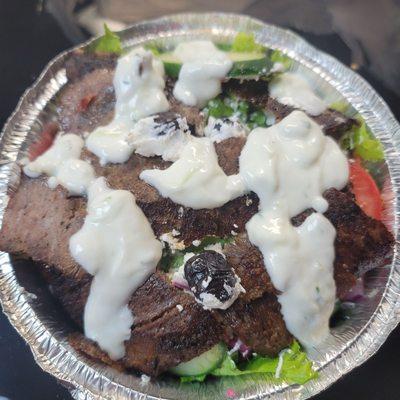 Mediterranean salad with gyro meat and tzatziki