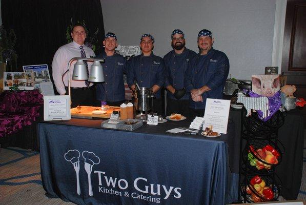 The Two Guys team serving a BBQ pit at March of Dimes 2018