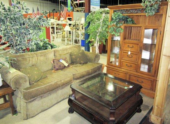 New and gently used entertainment centers, couches, and tables.