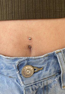 5-month old navel piercing performed by John Johnson. :)