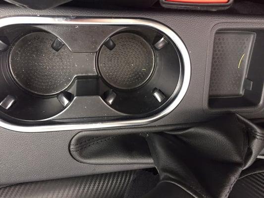 Poorly maintained cars:  bunch of debris in the cup holder.  Hi, old rosemary leaf or pine needle!