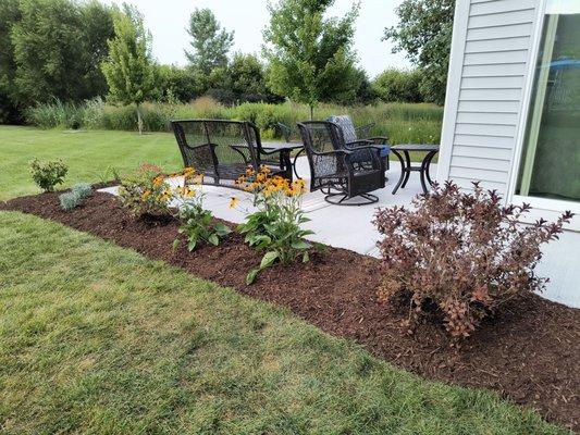 New flower beds added along patio