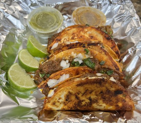 Quesabirria tacos(4) served with shredded beef, mozzarella cheese, topped with cilantro & onions. W/side of salsa verde & salsa roja.