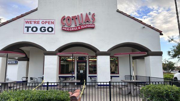 Outside: view of outdoor dining area from drive thru