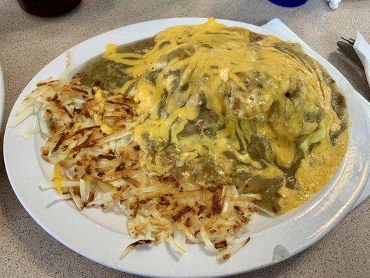 Bacon & cheese omelette smothered in green chili and even more cheese. With hash browns.