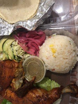 Chicken asado, cabbage slaw, avocado, rice, pickled onion, salsa, and tortillas. Not pictured: the black bean purée.  All of this for $17.