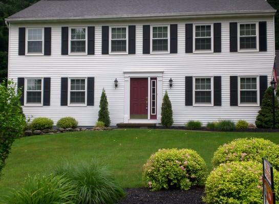 Removed 30-year-old wood windows and installed energy efficient premium windows.