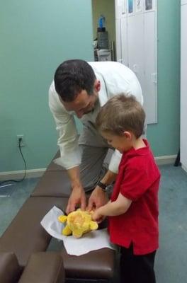 Dr. Sam puts aside special time to adjust those stuffed animals hugged a little too hard!