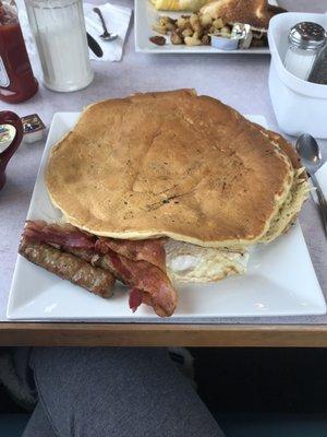 2 huge Blueberry Pancakes, eggs, sausage & bacon