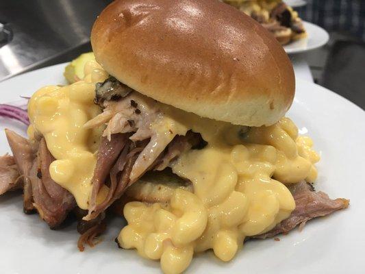 Hickory Smoked Pulled Pork topped with our Smoked Gouda Mac & Cheese