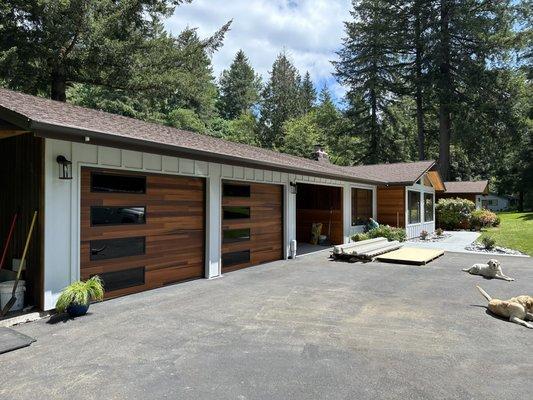 Exterior remodel. James hardie board and batten, cedar tongue and groove accent walls and soffit