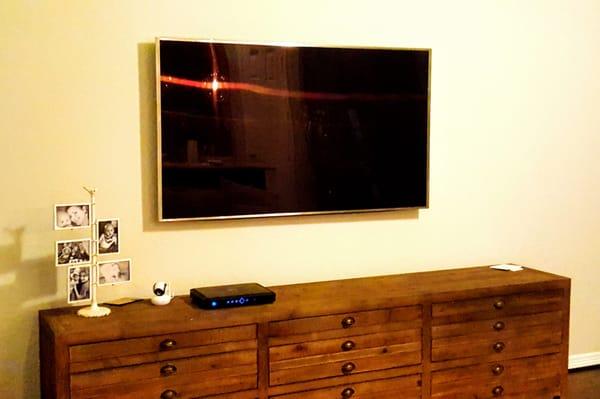 75" 4k LED TV install, tilt mount, In-wall wiring. 7.1 Surround Sound with in-ceiling speakers. audiovideotexas.com