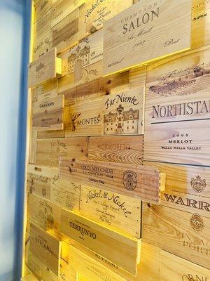 Cool wall made out of wine boxes