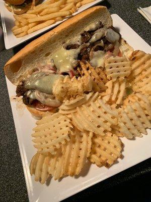 Philly cheesteak with waffle fries