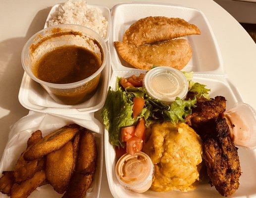 Heavenly food. Top right (clockwise) beef empanadas, Monfongo with Chicken, small salad, fried plantains, small (extra) beef stew, and rice.