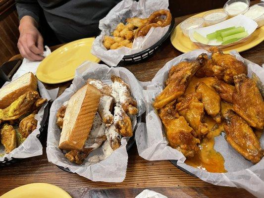 50 wings!!  Left to right lemon pepper, ranch, mild Appetizer trio with tots, onion rings & cheese wedges