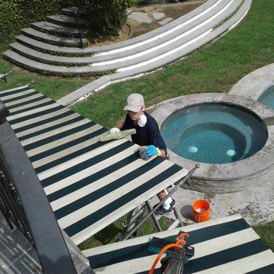 Silver lake's finest Fred cleaning awnings using his special method