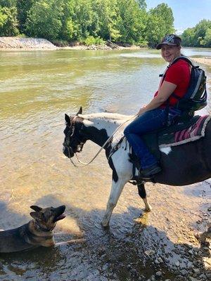 Trooper is able to go with me when I go horseback riding