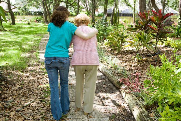 Out for her daily walk with our Caregiver. A job well done!