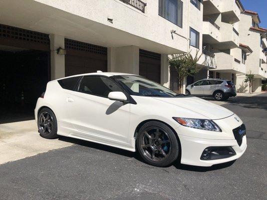 Mugen front lip, grille, and side skirts were painted and installed.