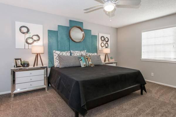 Beautiful Spacious Bedroom with large walk in closet and beautiful tiled shower.