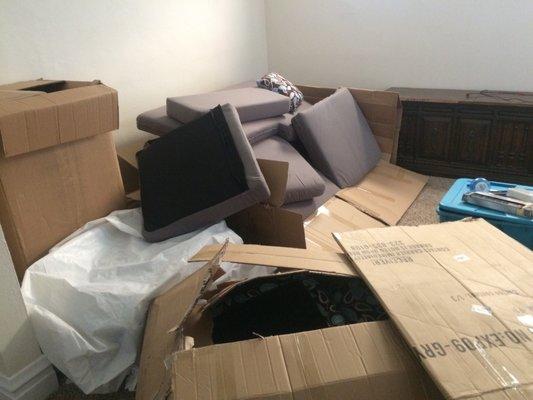 A bunch of couches I didn't order taking up my living room.