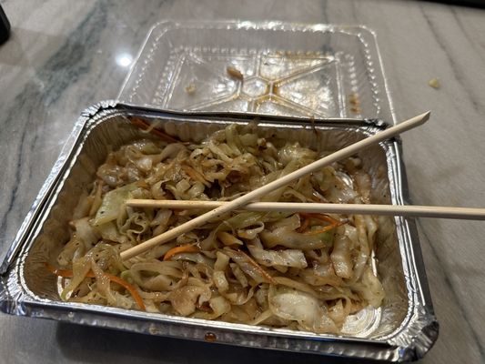 After eating what little chicken and noodles came in the dish, this was what was left - all cabbage.