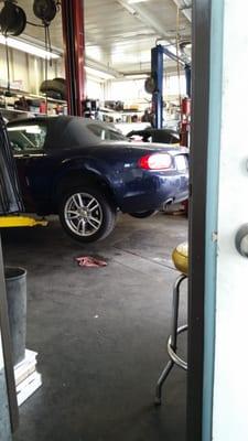 My cute lil convertible getting fixed up.