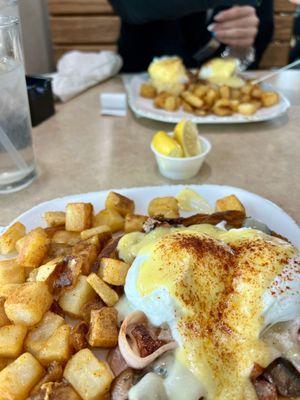 Parisian Benny (front) Classic Benny (back), both served with seasoned potatoes. Delish!