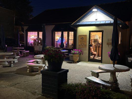 Front of restaurant showing outdoor tables.