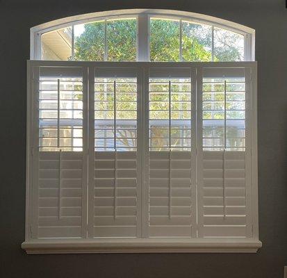 Plantation shutters with decorator sill cap